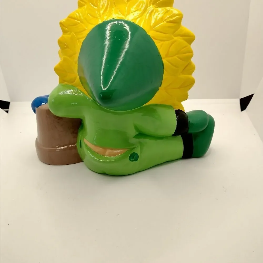 Hand Crafted Sun Flower Baby Figurine with a flower pot Painted Vintage Ceramic